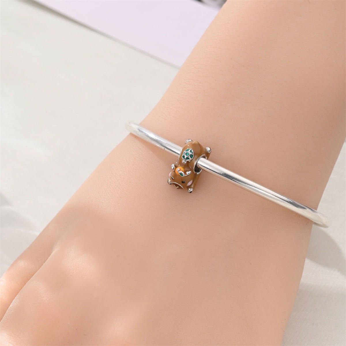 Capybara with Tangerine On Head Charm