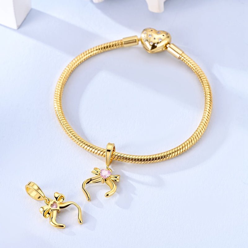 Gold Ribbon Bow with Pink Heart Dangle Charm