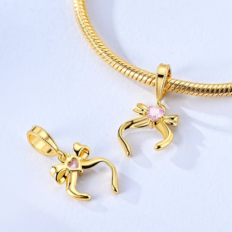 Gold Ribbon Bow with Pink Heart Dangle Charm