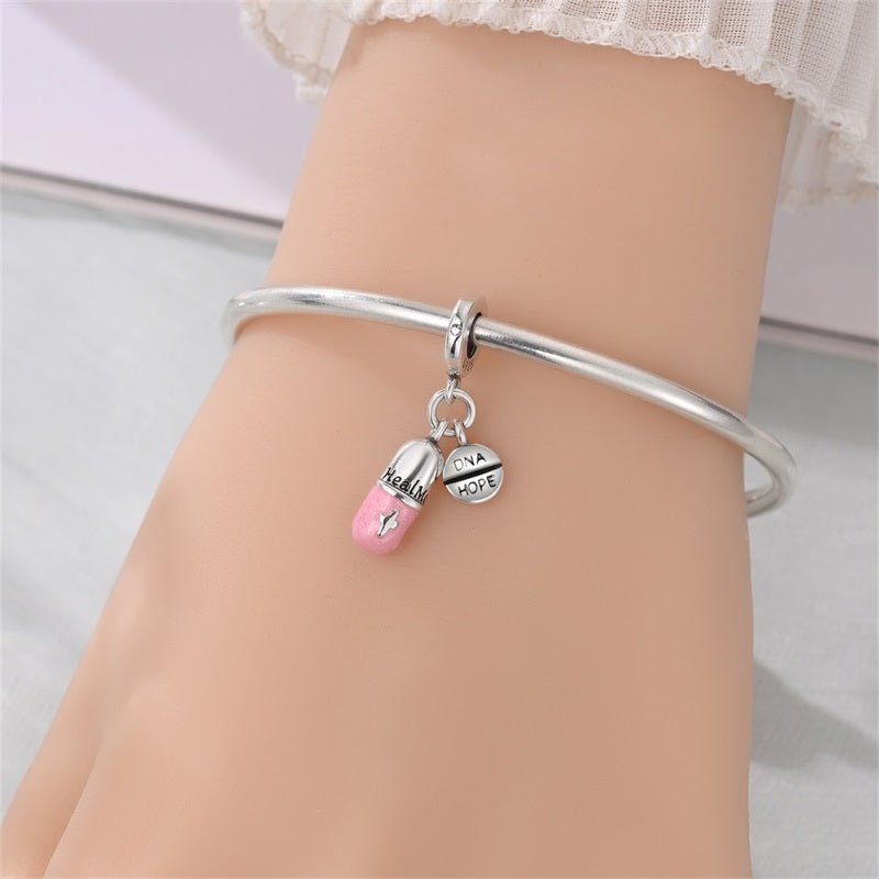 Healing Capsule Dangle Charm