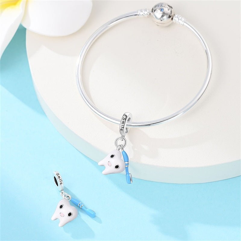 Smiling Tooth with Toothbrush Dangle Charm