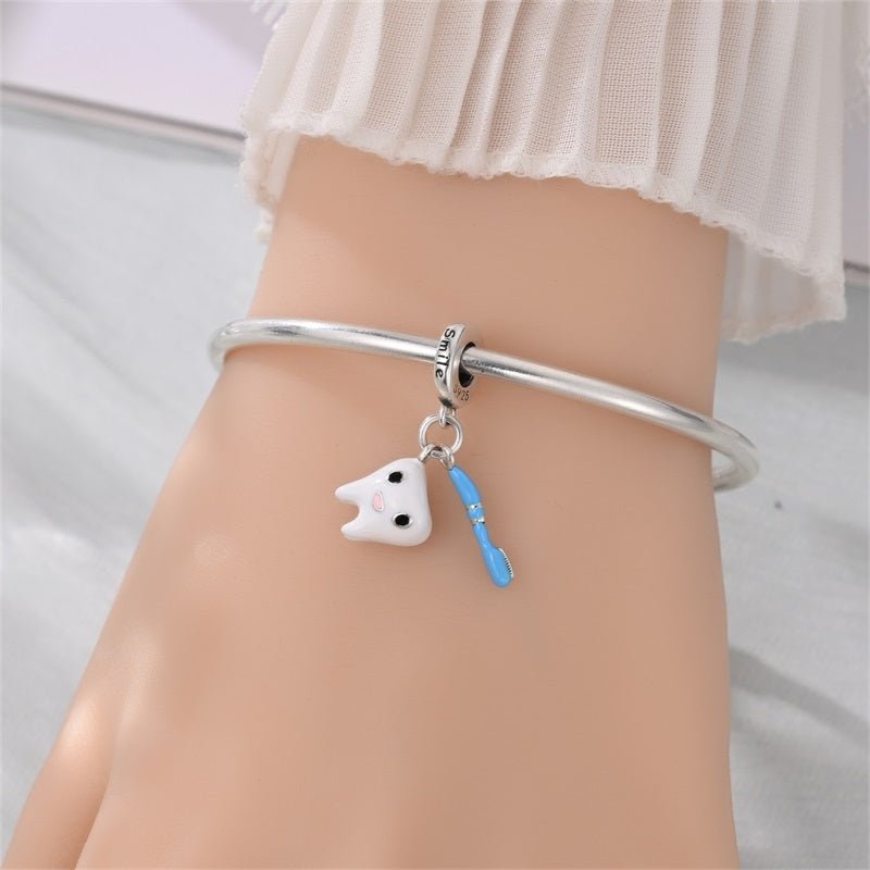 Smiling Tooth with Toothbrush Dangle Charm