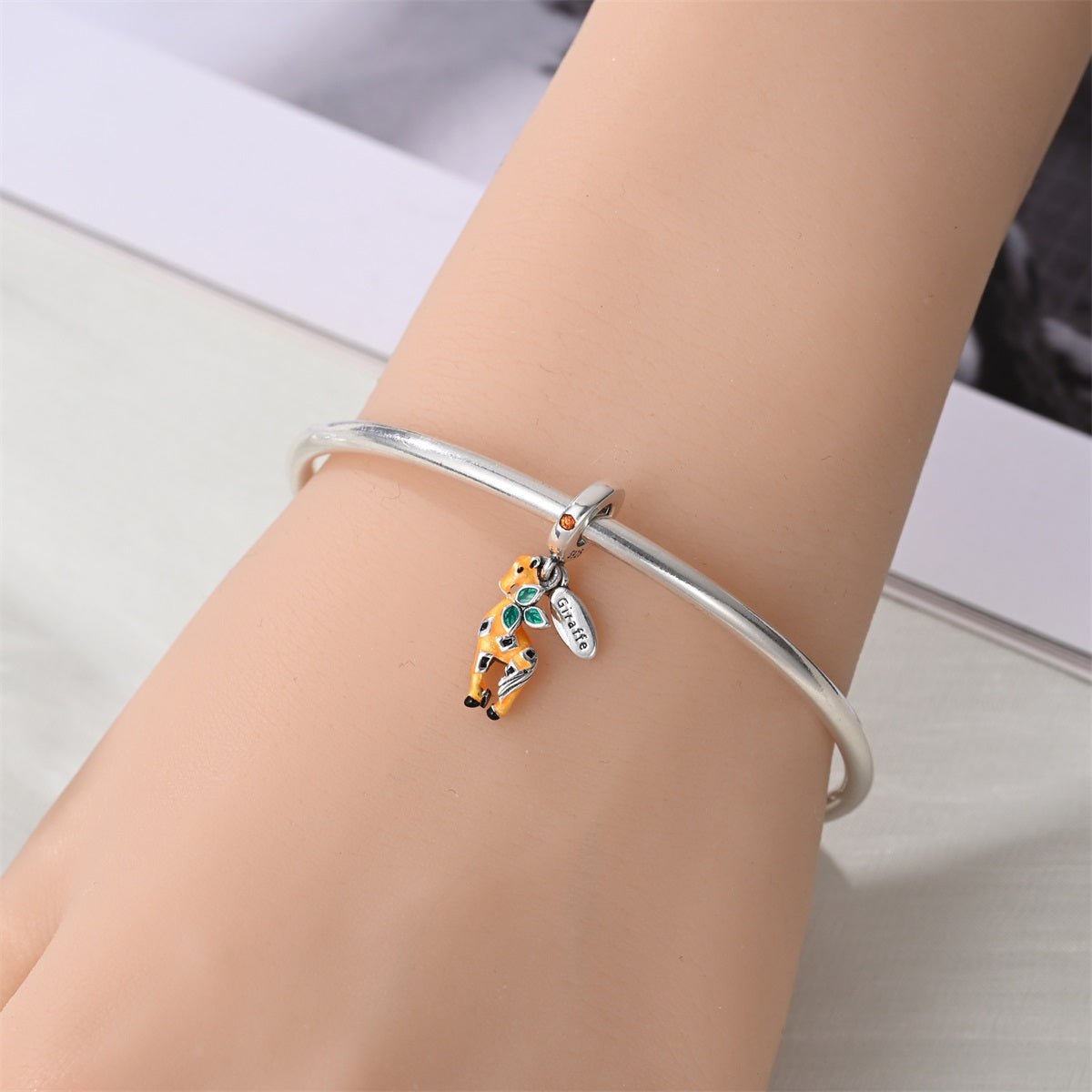 Giraffe with Leaves Dangle Charm