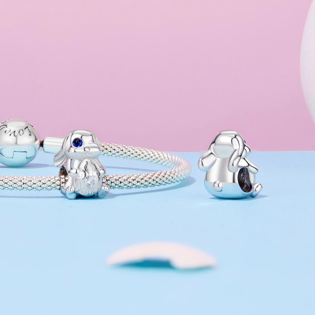 Winking Bunny with Heart-Shaped Egg Charm